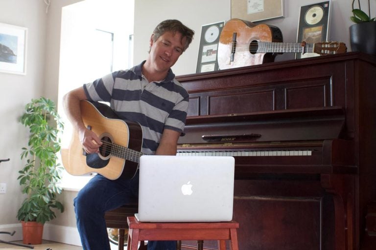 Jim Murray giving Irish guitar lessons online